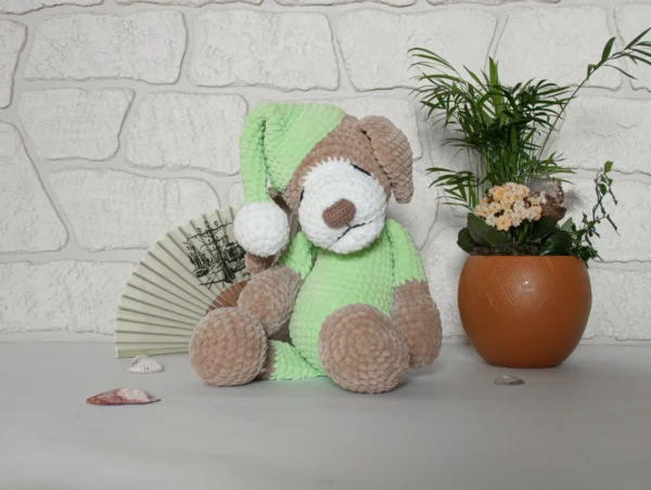 COZY HANDMADE SLEEPING PUPPY PLUSH, SOFT CROCHET DOG TOY WITH PAJAMAS - Image 4